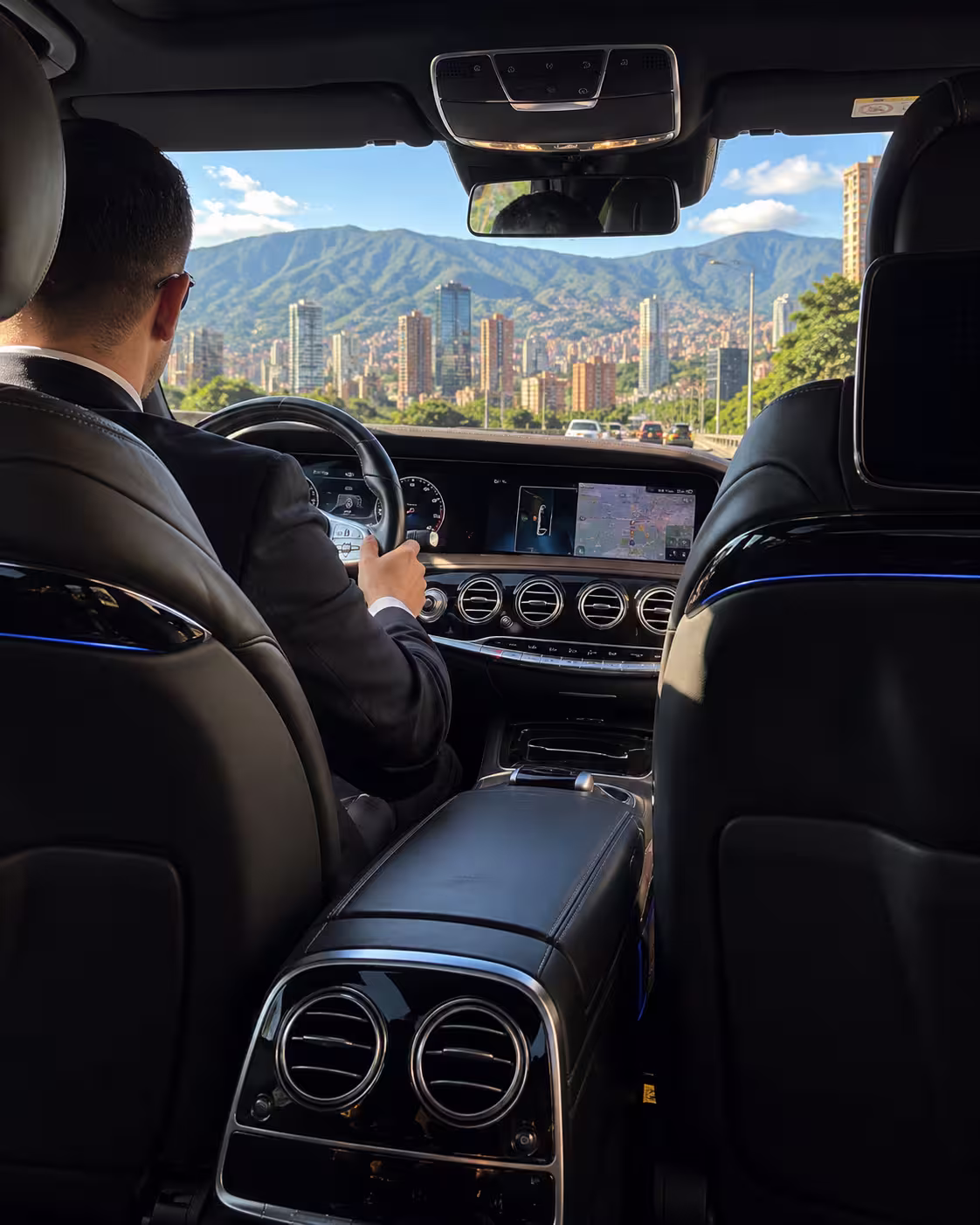 Interior of a luxury car with a professional private driver at the wheel